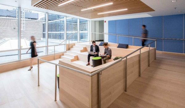 People moving through and working in Faculty of Dentistry collaboration space in Toronto.