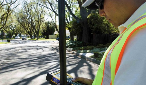 surveyor on urban city street