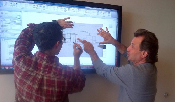 Raven Spanier pictured working on the original design of the Moncton Events Centre.