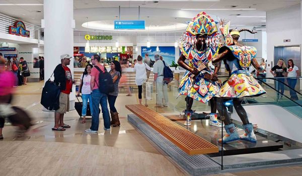 Traditional statues at Lynden Pindling International Airport in Nassau, Bahamas.