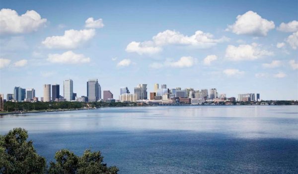 City skyline behind a lake