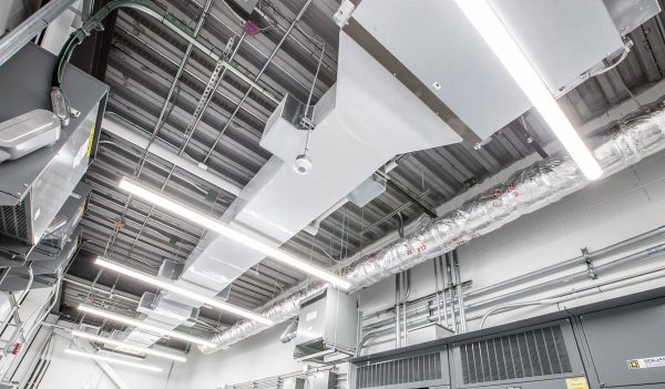 Looking up at mechanical systems on the ceiling