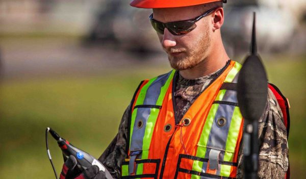 Man taking air and noise samples