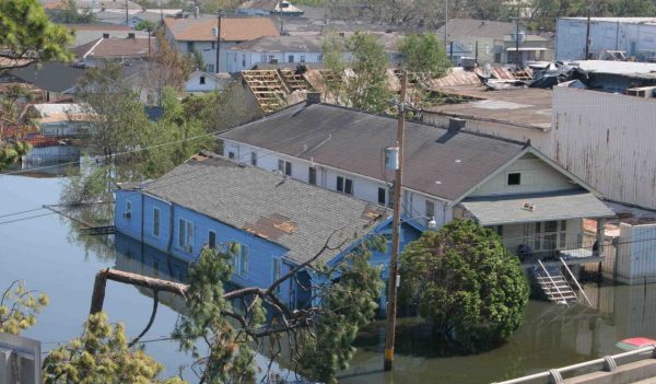 Damaged buildings and flooded streets.