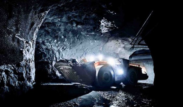 Front end loader in underground mine.