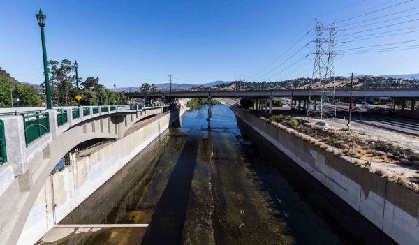 Los Angeles River near the Golden State 5 Freeway bridge alongside a viaduct in Southern California.  