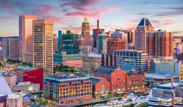 Baltimore, Maryland, USA Skyline over the Inner Harbor at dusk.