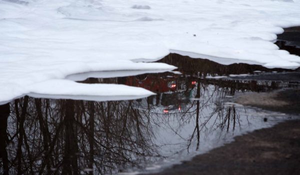 Firefighting foam on the ground surface following a tanker truck accident.