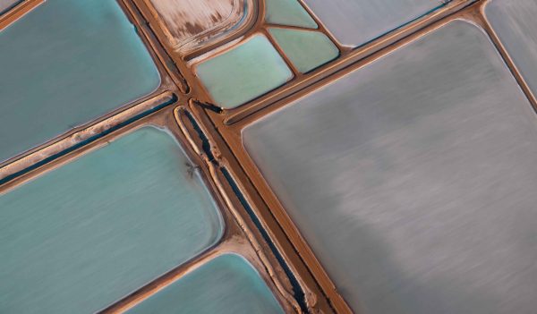 Aerial view of multiple tailings ponds.