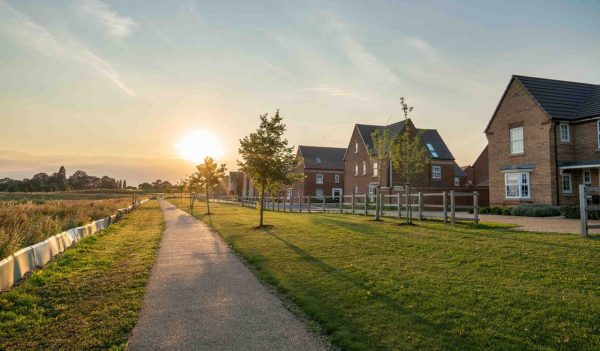 Empty walkway path at sunset near new build housing area in southern England