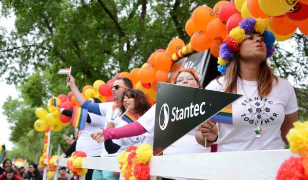 Stantec staff cheering on parade route