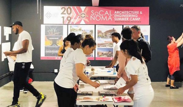 People doing crafts at a table