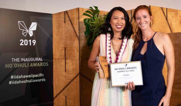 Jenny accepting an award.