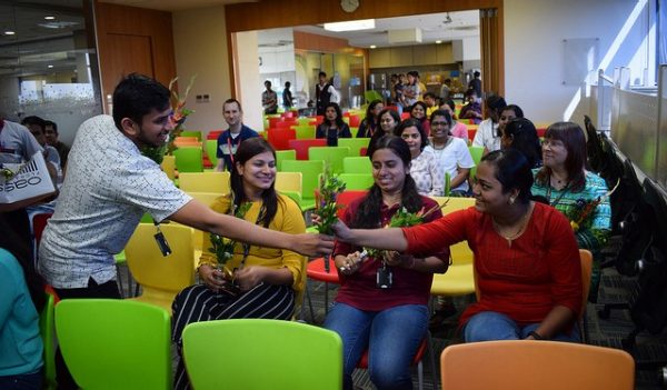 People greeting each other at an event