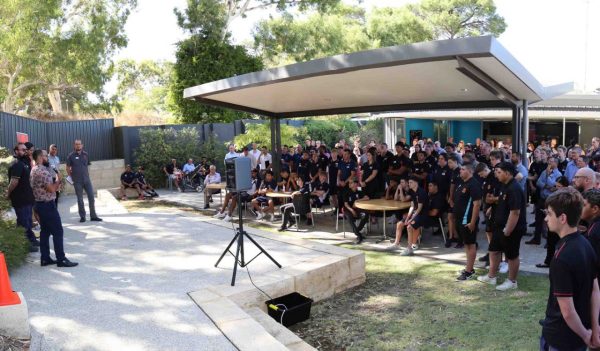 Students listening to a presentation.