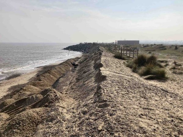 Suffolk beach with sand and the sea in the distance