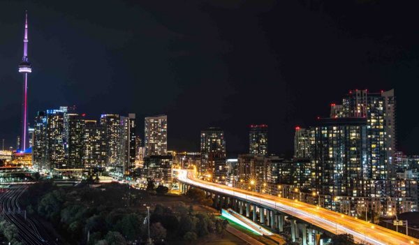 View of highway leading to downtown Toronto at night