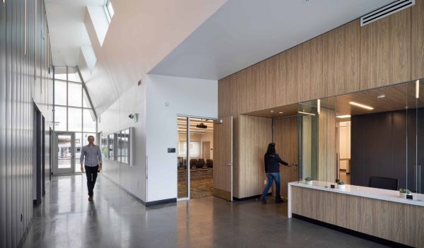 Main entrance with reception desk and meeting room