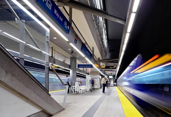 The platform with a train leaving the station