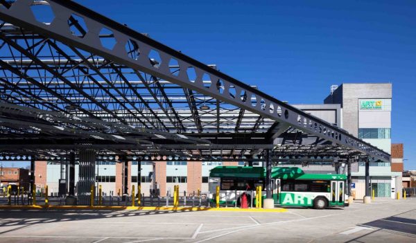 Outdoor covered area for bus fueling