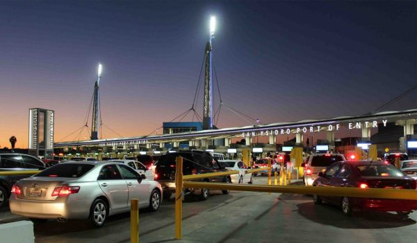 Cars lined up to enter customs at the port of entry facility