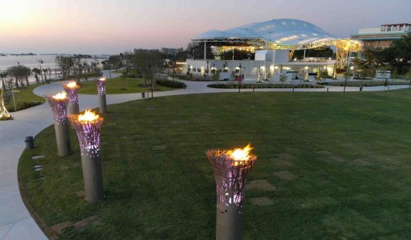 Path with lights leading up to an outdoor covered structure