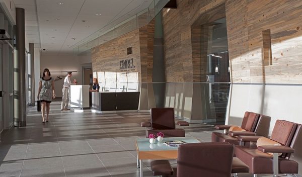 Interior main reception with a desk and seating area