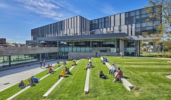 Outdoor lawn and seating in front of the building