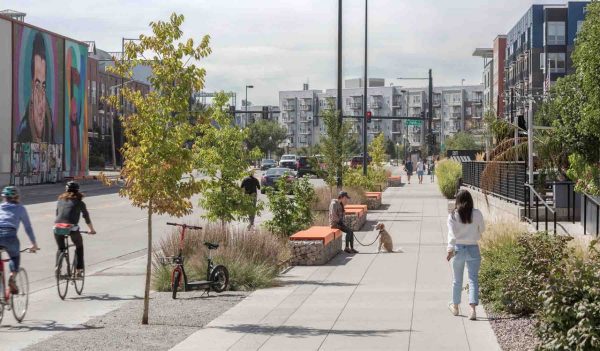 Please walking and cycling along the street that has benches and plantings