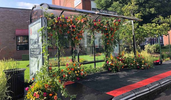 Rendering of bus stop with flowers