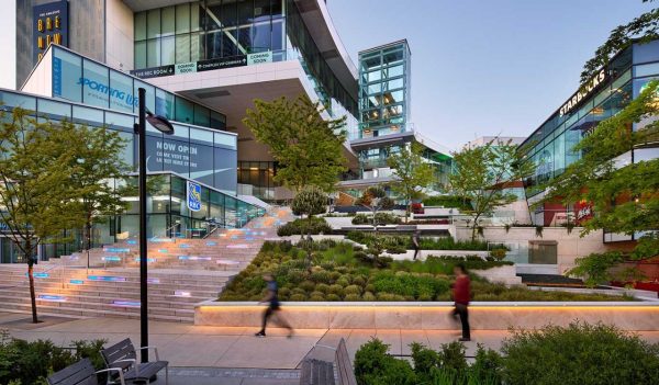 Outdoor garden with stairs to the retail stores