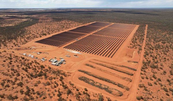 Aerial view of a solar farm in a remote setting