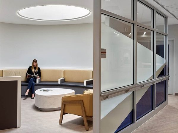 Woman sitting in a hospital waiting area