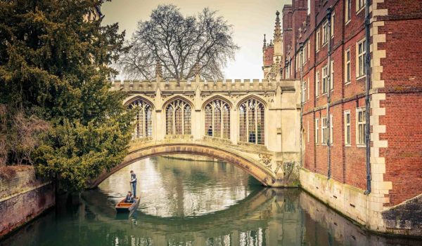 Stone covered bridge over the River Cam.